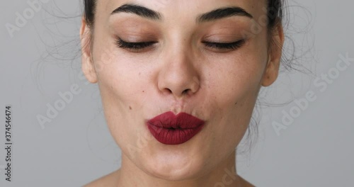 The close up shot of woman whistling