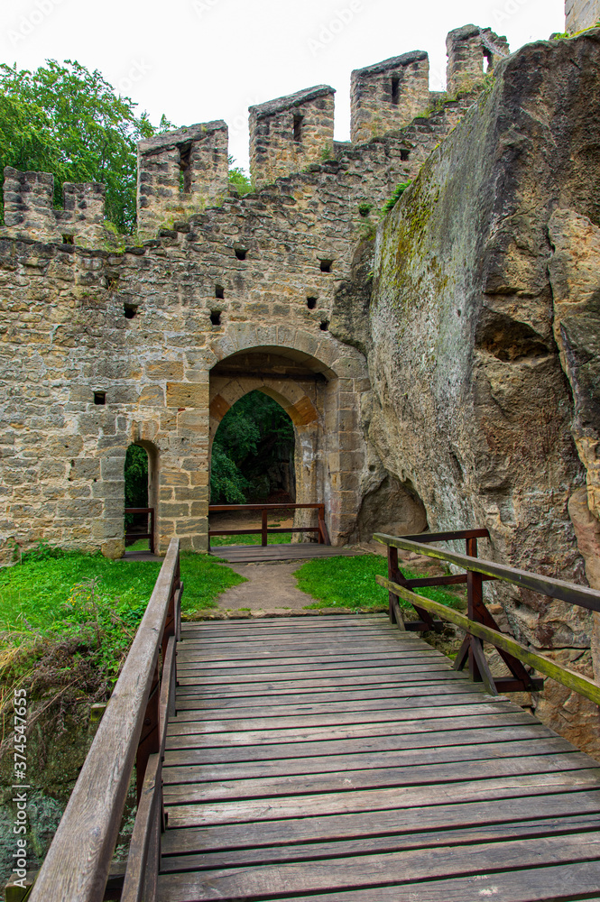 bridge and arch window withing the walls of the old castle Helfenburk u Usteka in the czech republic