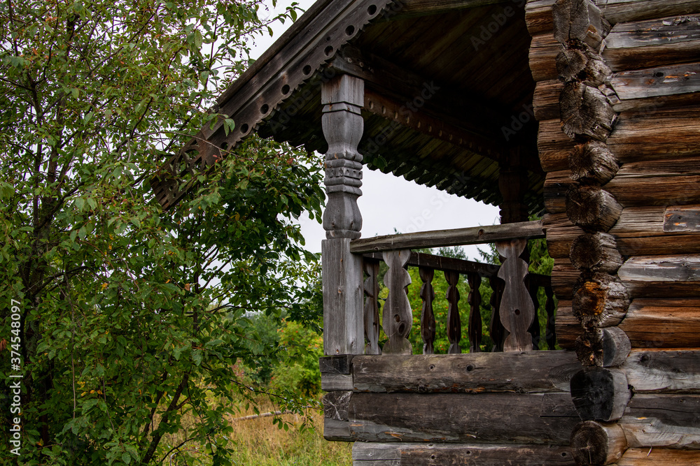 old wooden church on the island between trees in the rain old wooden church on the island between trees in the rain