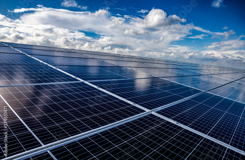 Foto Solar photovoltaic modules under clear sky