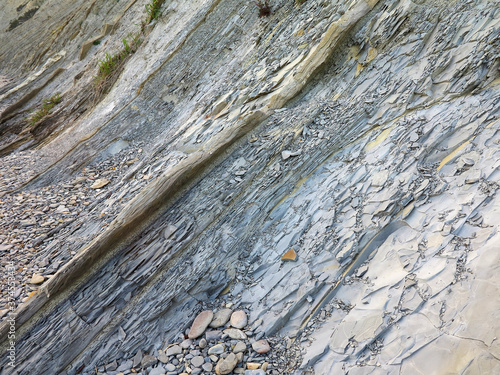 textured background of rock structure. Caucasus Mountains