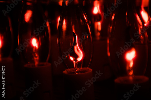 red electric candles glow in the dark