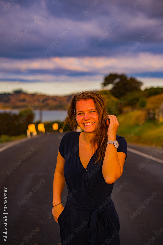 young woman posing on a street young woman posing on a street