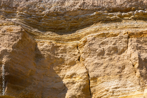 textured background of rock structure. Caucasus Mountains © Elena