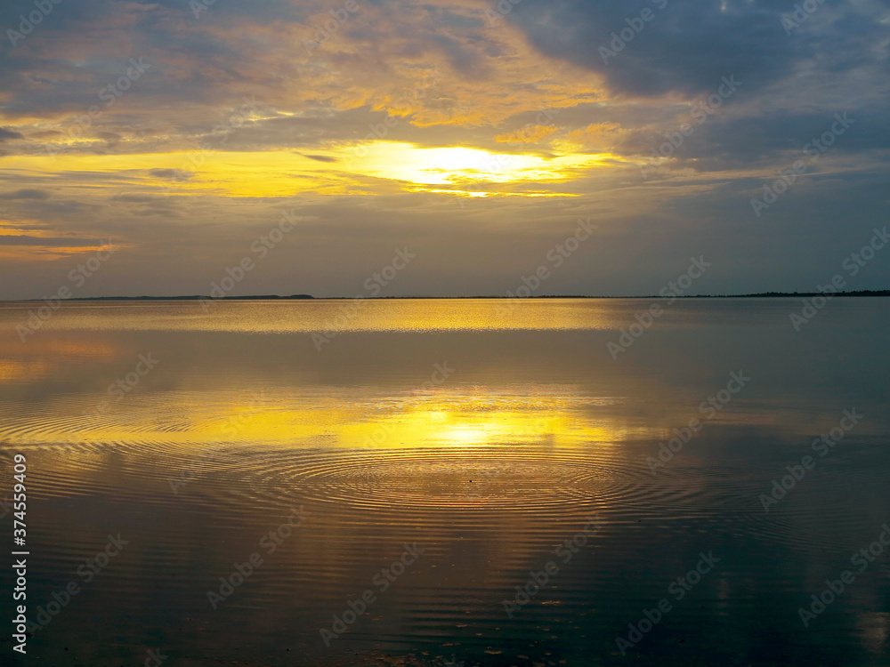 Authentic water landscape at sunset on a beautiful evening. Vityazevsky Liman, Krasnodar Territory, Russia