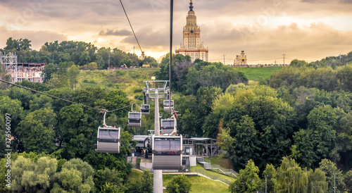 Landscape of Moscow at sunset, Russia. Scenic panoramic view of cable car and Moscow State University on Sparrow Hills.