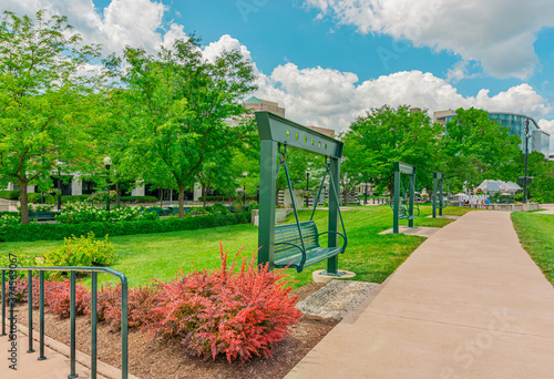 Downtown Dayton Ohio hosts the Five Rivers Metropark, with recreational swings and benches.