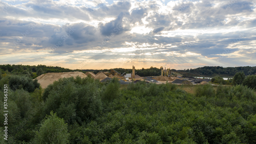 aerial view on gravel pit with sunset