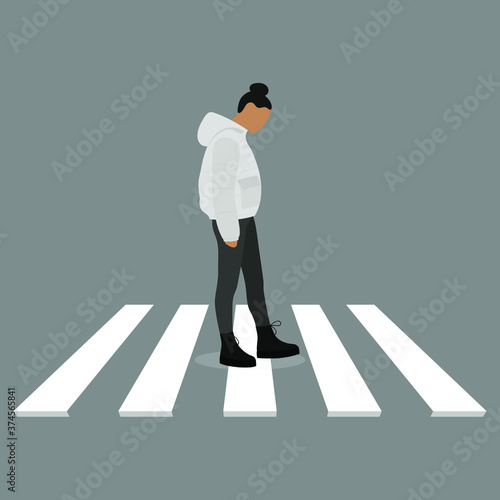 Female character in a jacket goes slowly on a pedestrian crossing