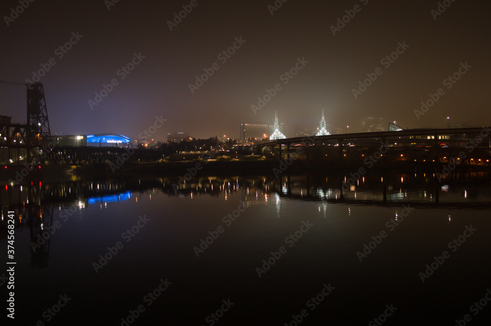 Highway Bridge and Buildings Reflected in Willamette River at Night, Portland, Oregon, USA