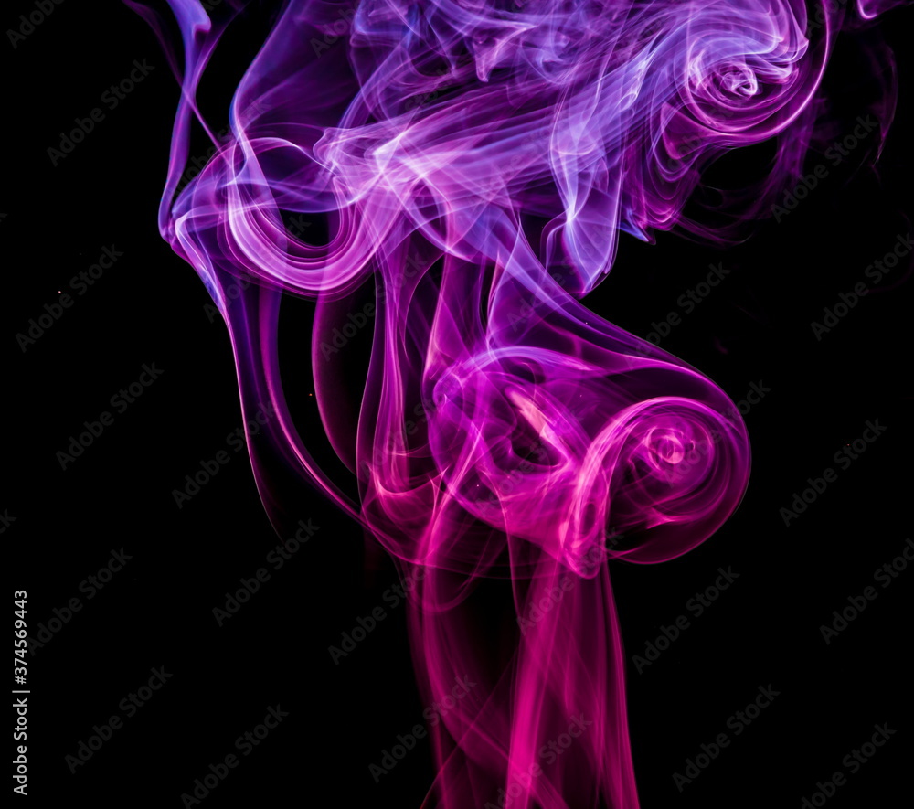 Obraz premium Colored smoke on black background