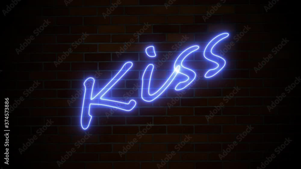 Kiss and heart neon light message flashing on brick wall night background Kiss and heart neon light message flashing on brick wall night background