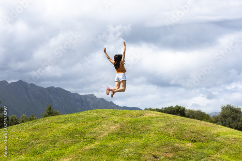 Girl jumping in nature