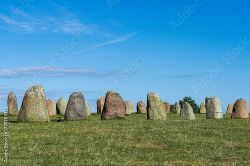 Ale Stones (Ales stenar) Is a megalithic monument of 59 large boulders and is 67 meters long. This landmark is located in Kåseberga, Sweden. photo