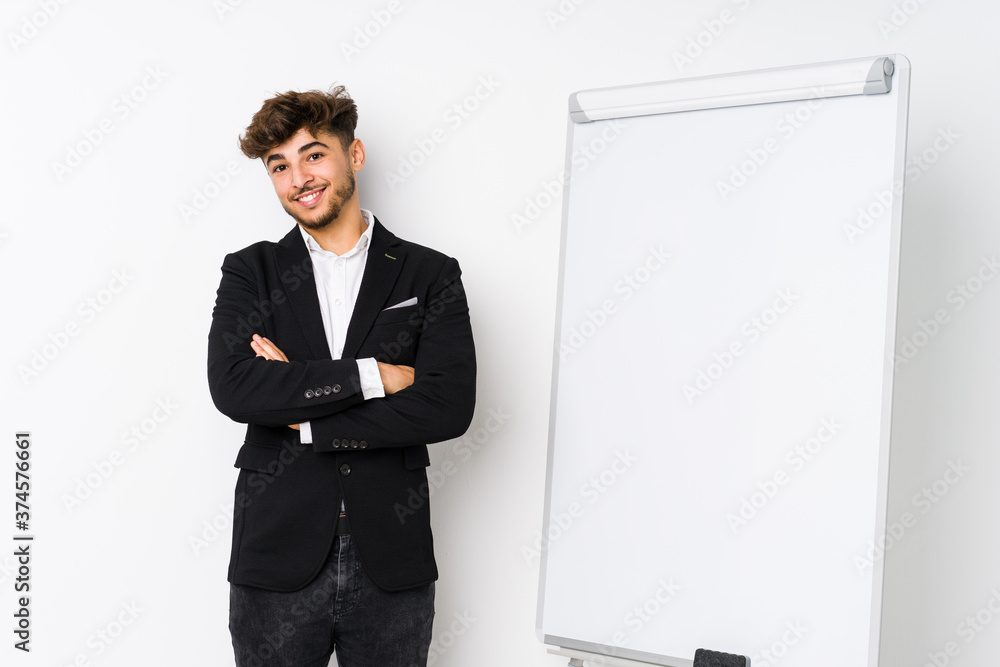 Young business coaching arabian man happy, smiling and cheerful. Young business coaching arabian man happy, smiling and cheerful.