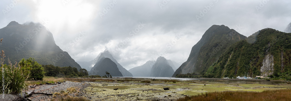 Panorama of Milford Sound during bad rainy weather, South Island/New Zealand - obrazy, fototapety, plakaty 