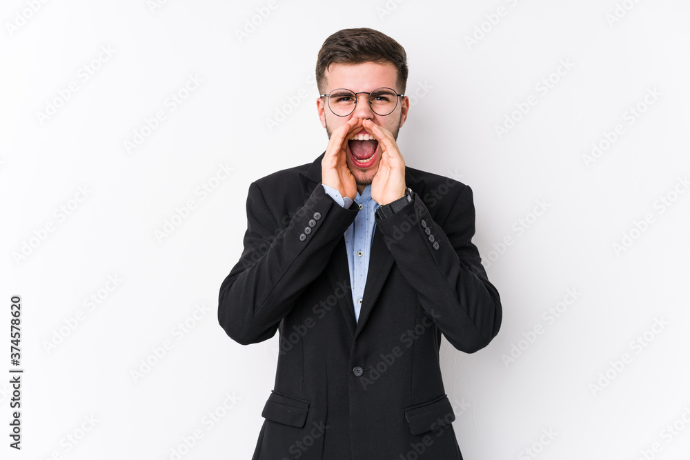 Young caucasian business man posing in a white background isolated Young caucasian business man shouting excited to front. Young caucasian business man posing in a white background isolated Young caucasian business man shouting excited to front.