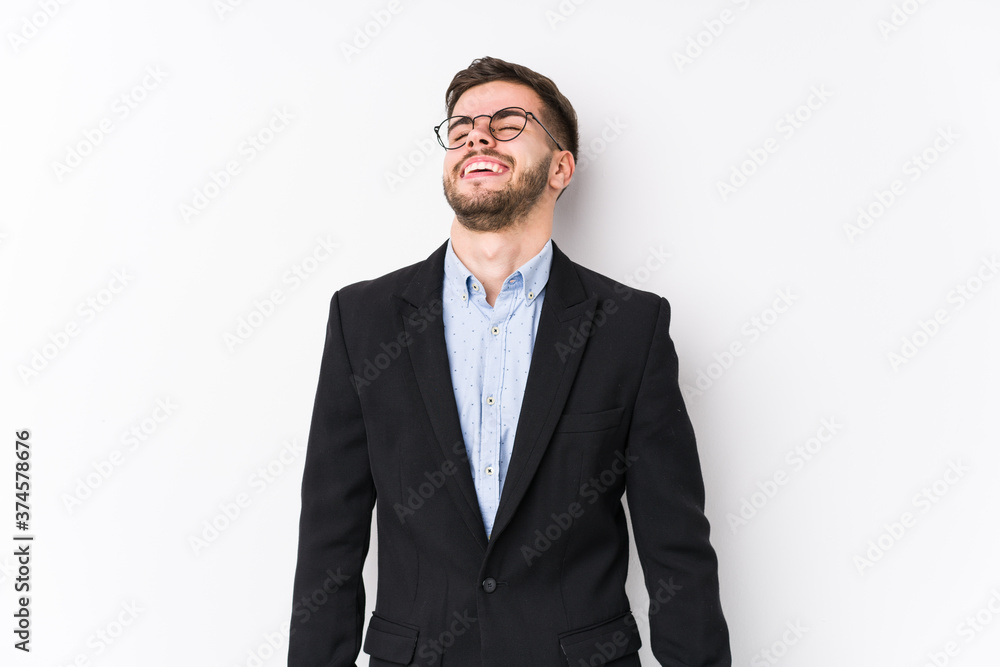 Young caucasian business man posing in a white background isolated Young caucasian business man relaxed and happy laughing, neck stretched showing teeth. Young caucasian business man posing in a white background isolated Young caucasian business man relaxed and happy laughing, neck stretched showing teeth.