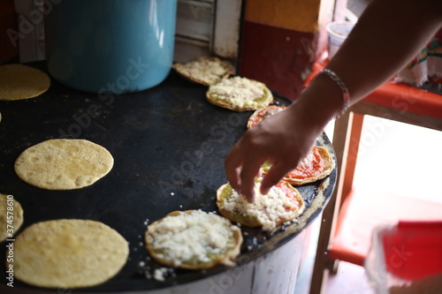 Sopes con queso verdes y rojos, fonda mexicana. mexico photo