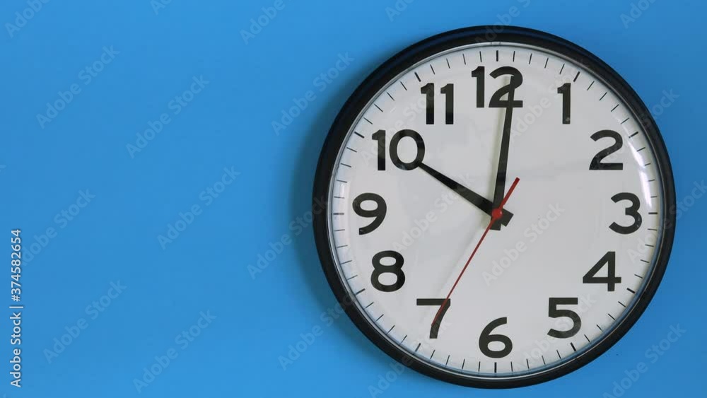 Clock on a Blue Background with Room for Copy Clock on a Blue Background with Room for Copy