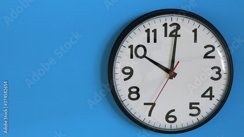 Wallpaper Mural Clock on a Blue Background with Room for Copy Torontodigital.ca