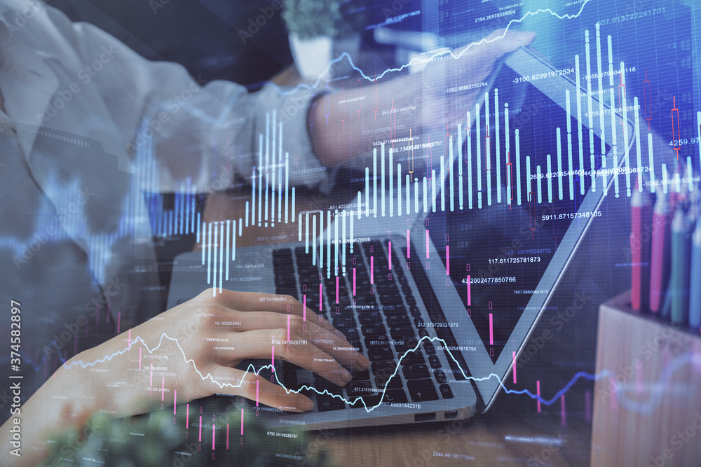 Double exposure of woman hands typing on computer and forex chart hologram drawing. Stock market invest concept.