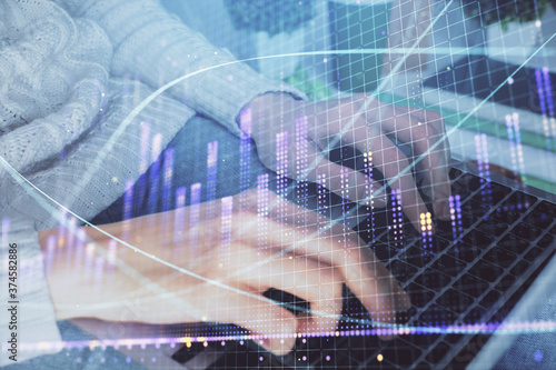 Wallpaper Mural Double exposure of woman hands typing on computer and forex chart hologram drawing. Stock market invest concept. Torontodigital.ca