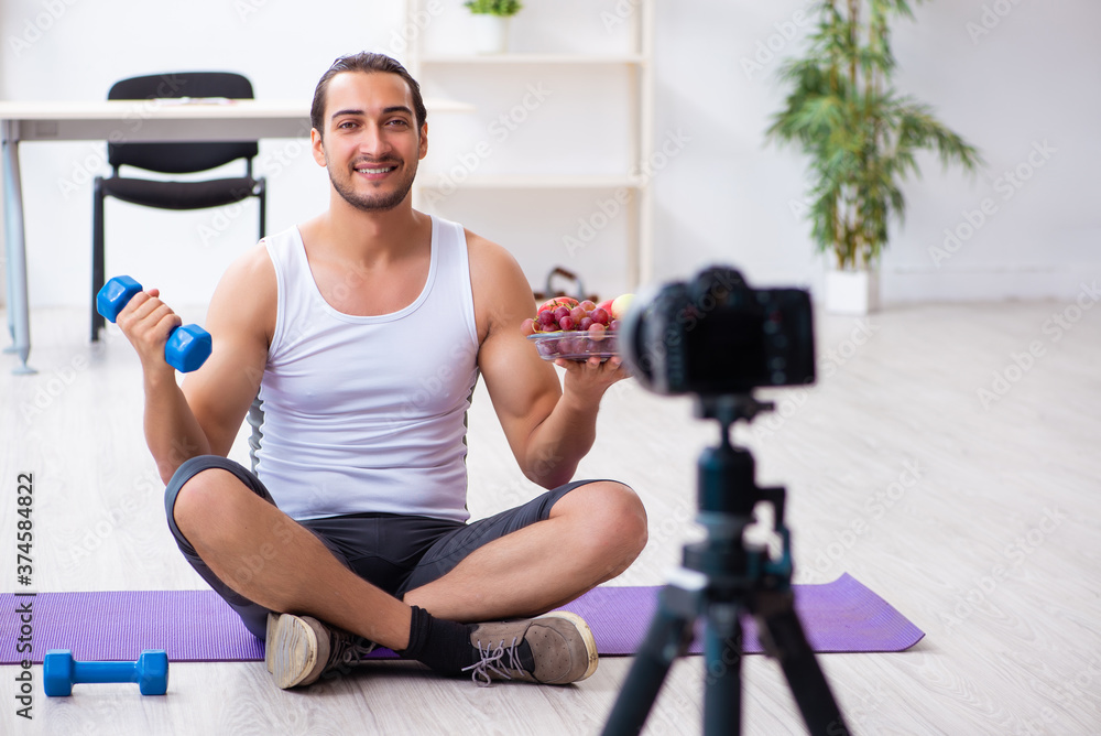 Fototapeta premium Young male blogger in dieting concept