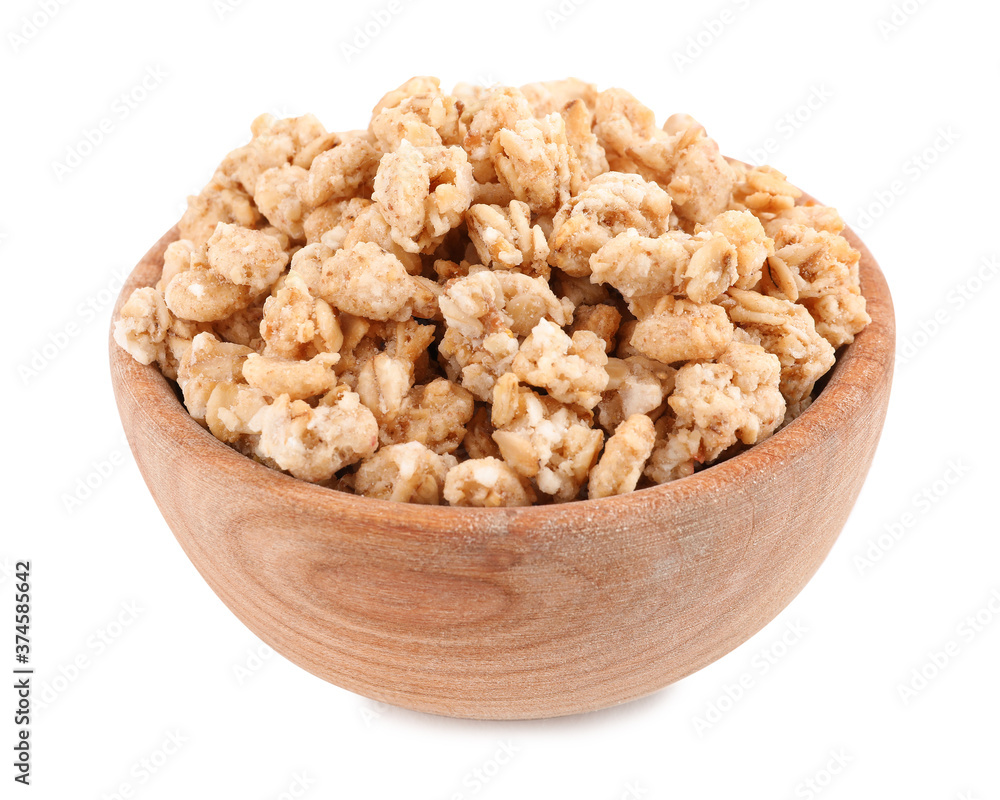 Tasty crispy granola in wooden bowl isolated on white Tasty crispy granola in wooden bowl isolated on white