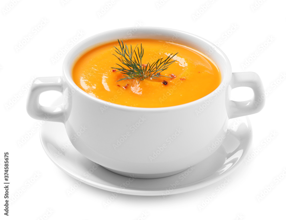 Tasty creamy pumpkin soup in bowl on white background Tasty creamy pumpkin soup in bowl on white background