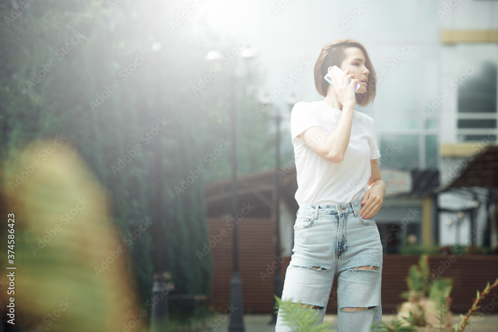 Fototapeta premium Hipster girl casual wear. Summer city portrait