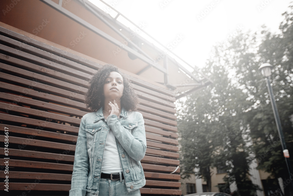 Fototapeta premium Black young pretty girl relaxing outdoor