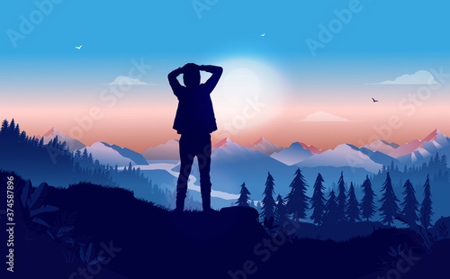 Fotografia Thinking about life - Person standing on hilltop contemplating and wondering about what the future will bring
