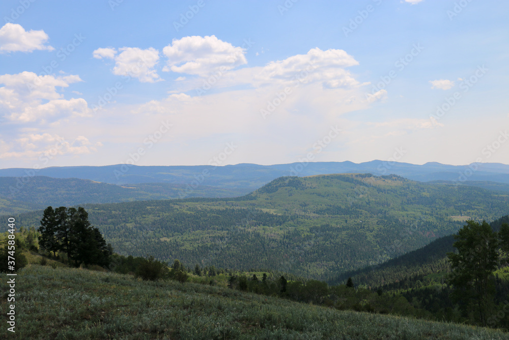 Naklejka premium clouds over the mountains
