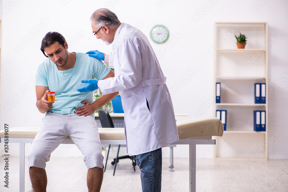 Young male patient visiting experienced doctor