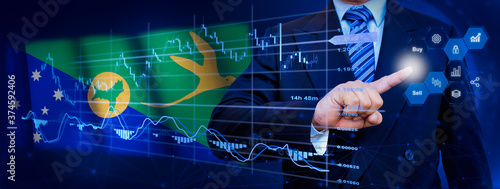 Businessman touching data analytics process system with KPI financial charts, dashboard of stock and marketing on virtual interface. With Christmas Island flag in background. © TexBr
