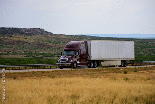 Arizona, USA - May, 2020: Beautiful truck on the road on a background of nature. American cargo.