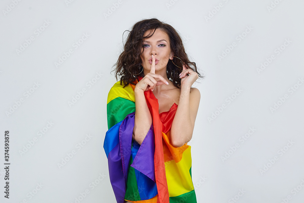 attractive brunette posing with the flag of the LGBT attractive brunette posing with the flag of the LGBT