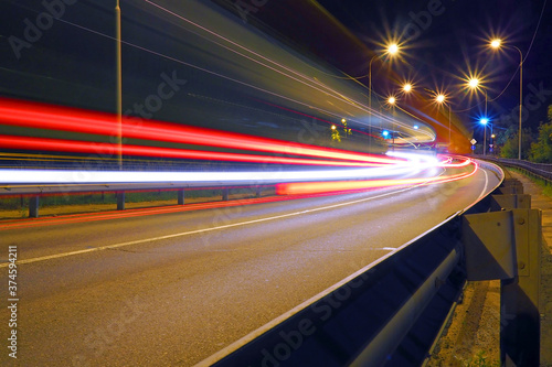 Abstract background of car lights on the road. Night car traffic