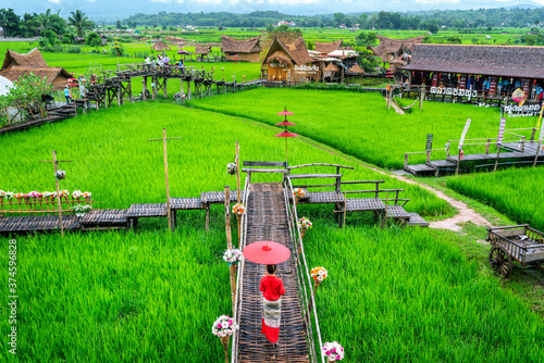 Obraz na plátně Asian women wearing Thai dress costume traditional according Thai culture at famous place in Nan province, Thailand