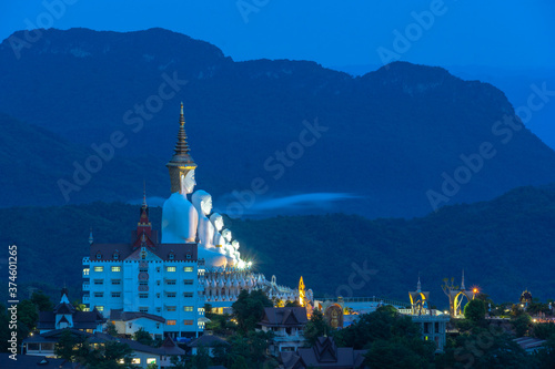 .the beautiful wat Phachonkeaw in twilight..5 sitting buddha statues on Khao Kho hill the beautiful landmark and famous in Thailand... photo