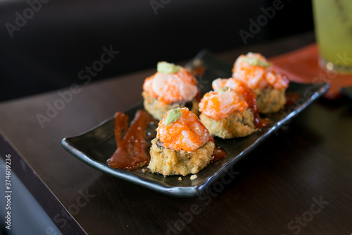 Set tempura maki sushi rolls fries - japanese food style. Hot fried Sushi Roll. Sushi menu. Japanese food. Hot fried Sushi Roll