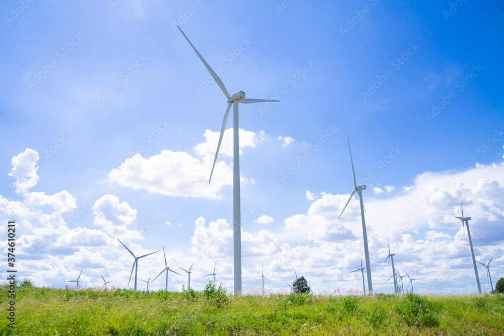 The wind turbines used to generate electricity provide clean energy to the earth on clear days The wind turbines used to generate electricity provide clean energy to the earth on clear days