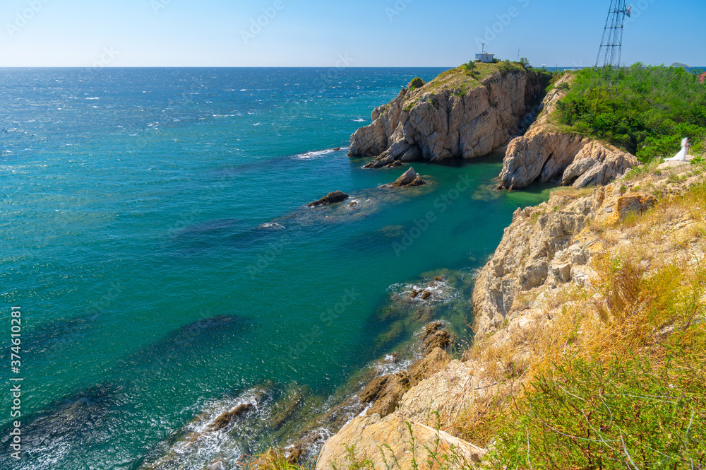 Obraz premium The scenery of Dalian Golden Stone National Geopark and Coastal Road in late Summer