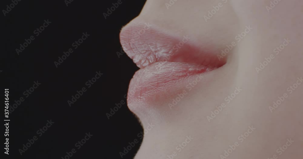Macro. Eating Girl with Braces. Lips Macro. Eating Girl with Braces. Lips