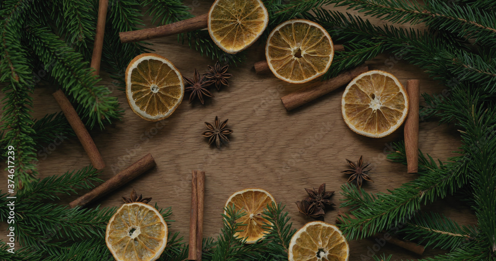 Top view christmas composition with spruce branches and natural decorations Top view christmas composition with spruce branches and natural decorations