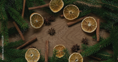 Top view christmas composition with spruce branches and natural decorations