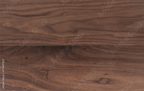 Texture of sanded raw black walnut wood without finish