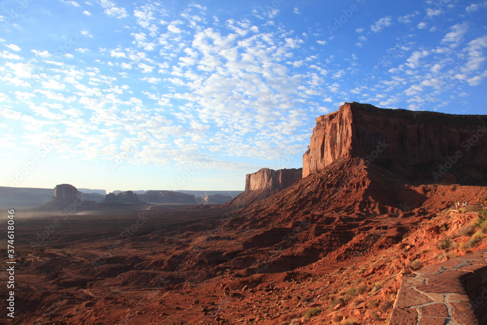 View of The mittens in Monument Valley tribal park during sunrise in Arizona, USA