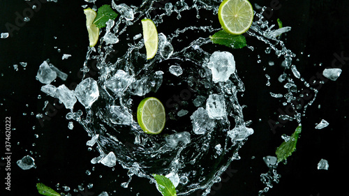 Fresh ripe limes with ice c...